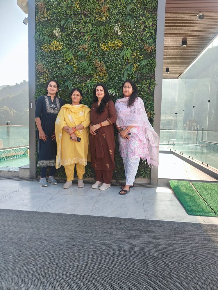 Group at a hotel rooftop in the hills
