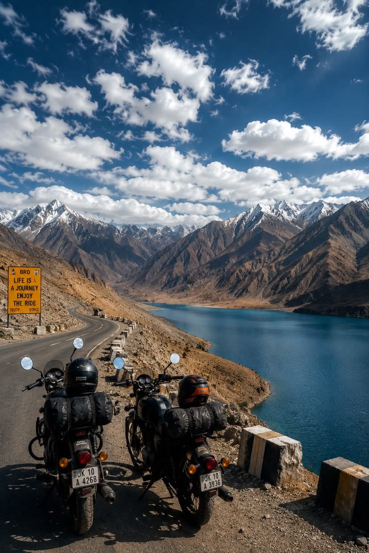 Motorbikes parked above a mountain lake, Ladakh