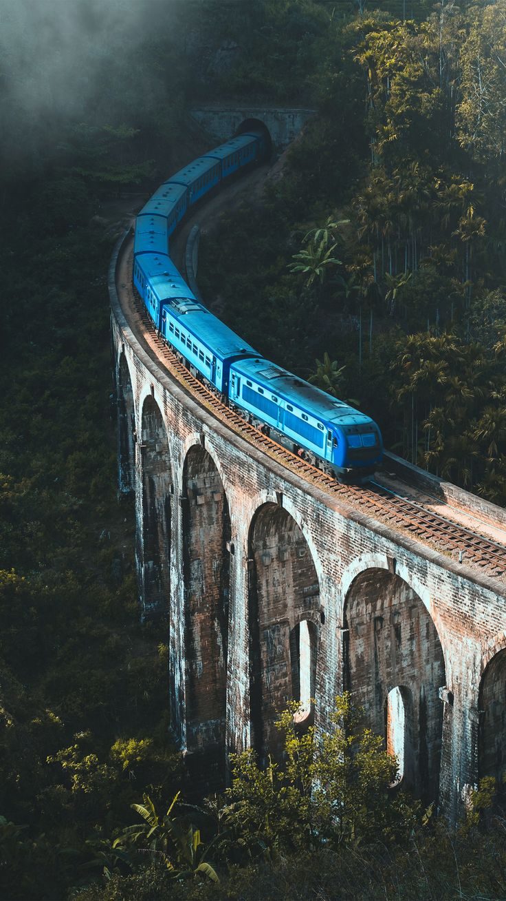 Blue train on the Nine Arch Bridge, Sri Lanka