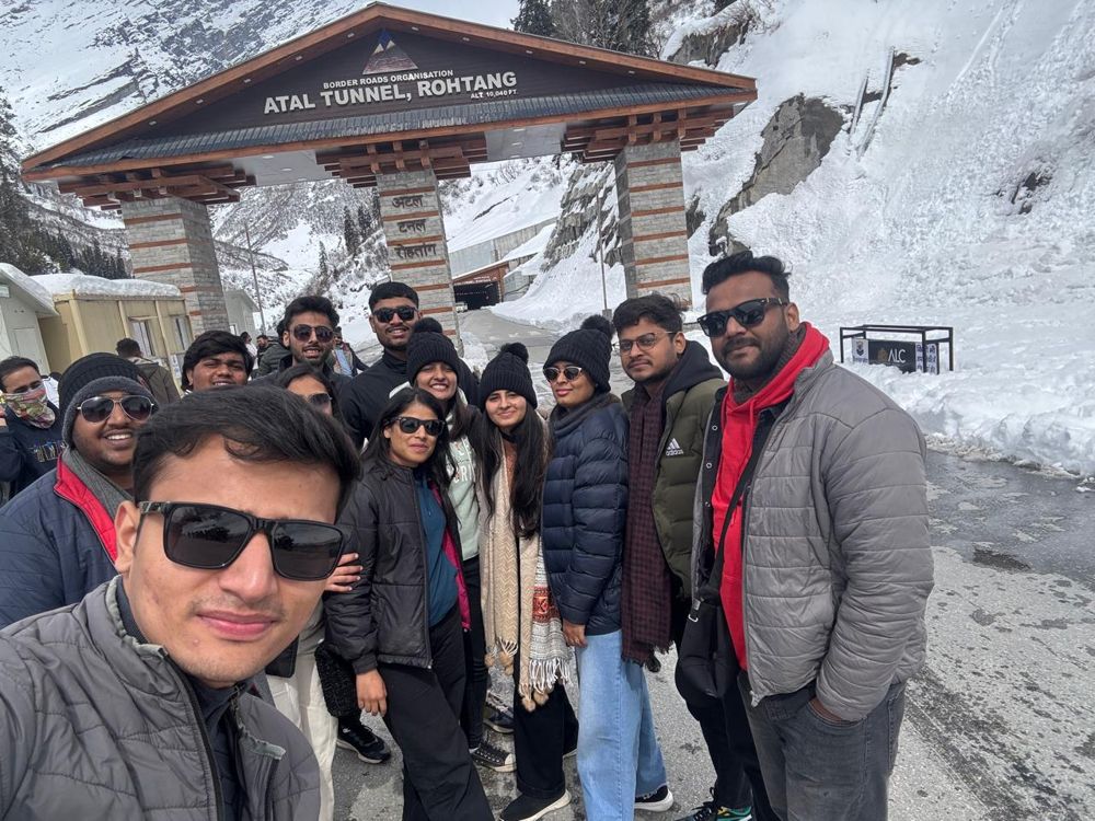 Group selfie at the Atal Tunnel gate in the snow, Rohtang