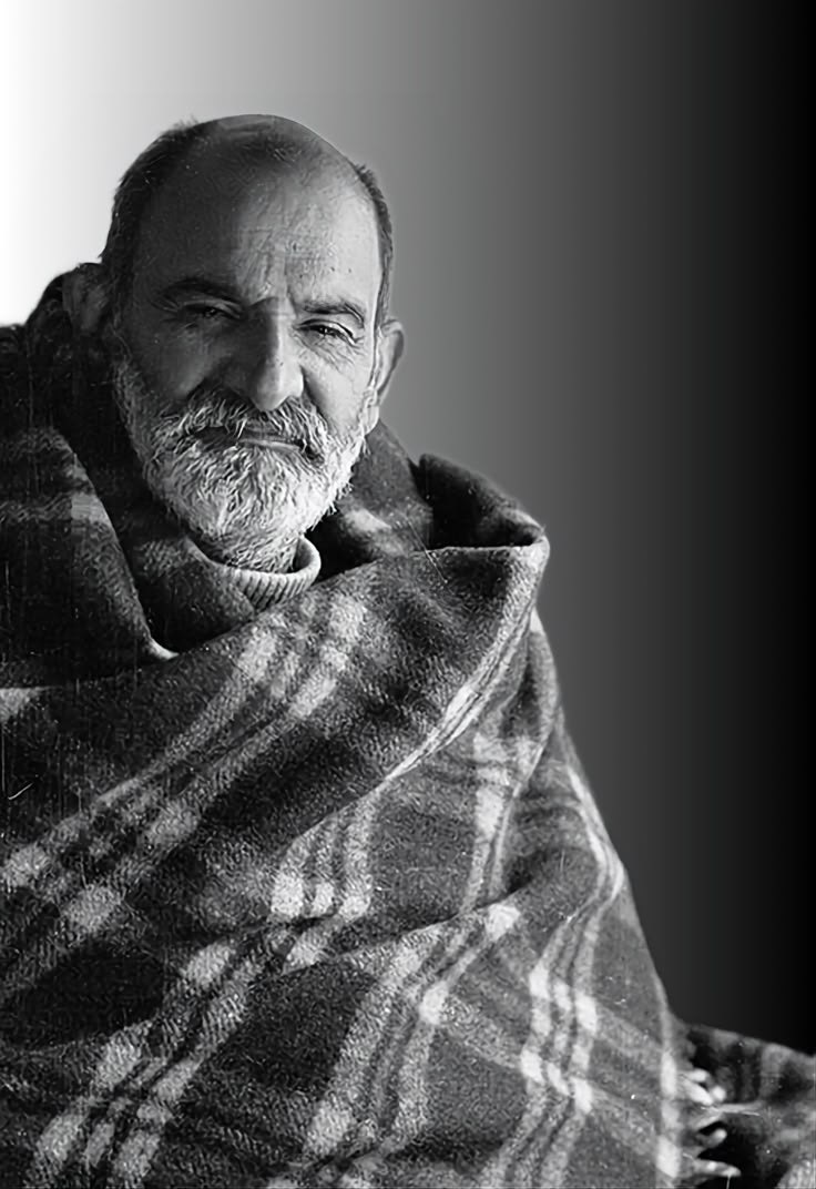Neem Karoli Baba (Maharaj-ji) wrapped in his plaid blanket