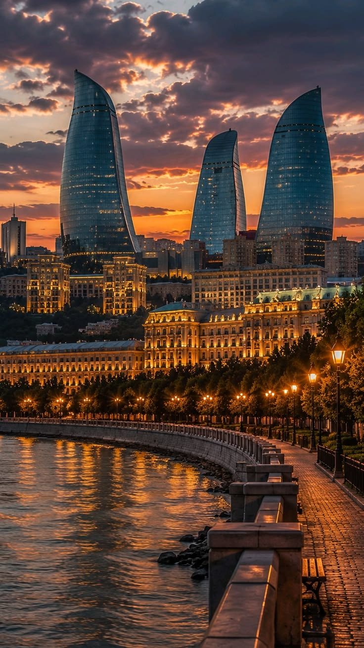 Flame Towers over the Baku boulevard at sunset