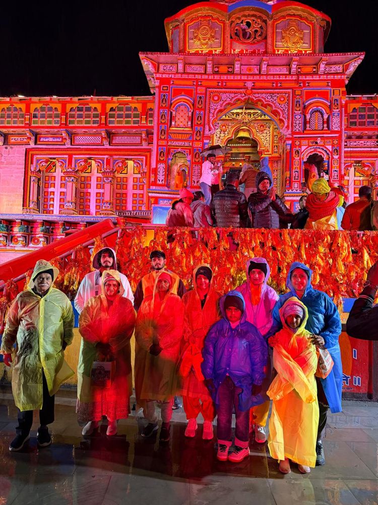 Family group at Badrinath temple at night