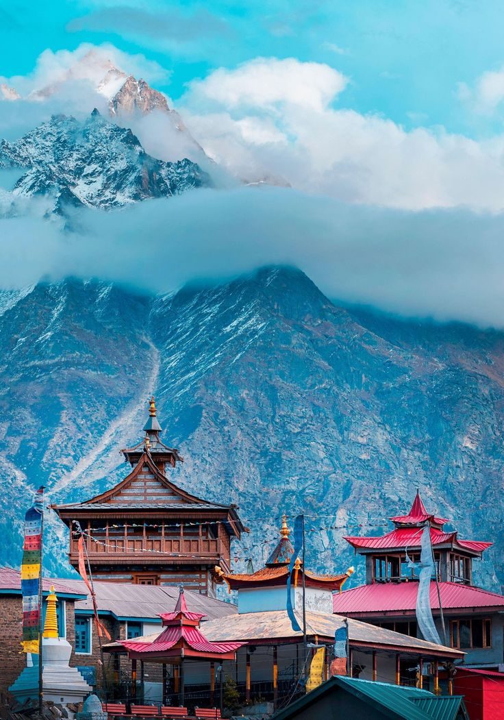 Temples below snowy peaks in Kalpa, Himachal Pradesh