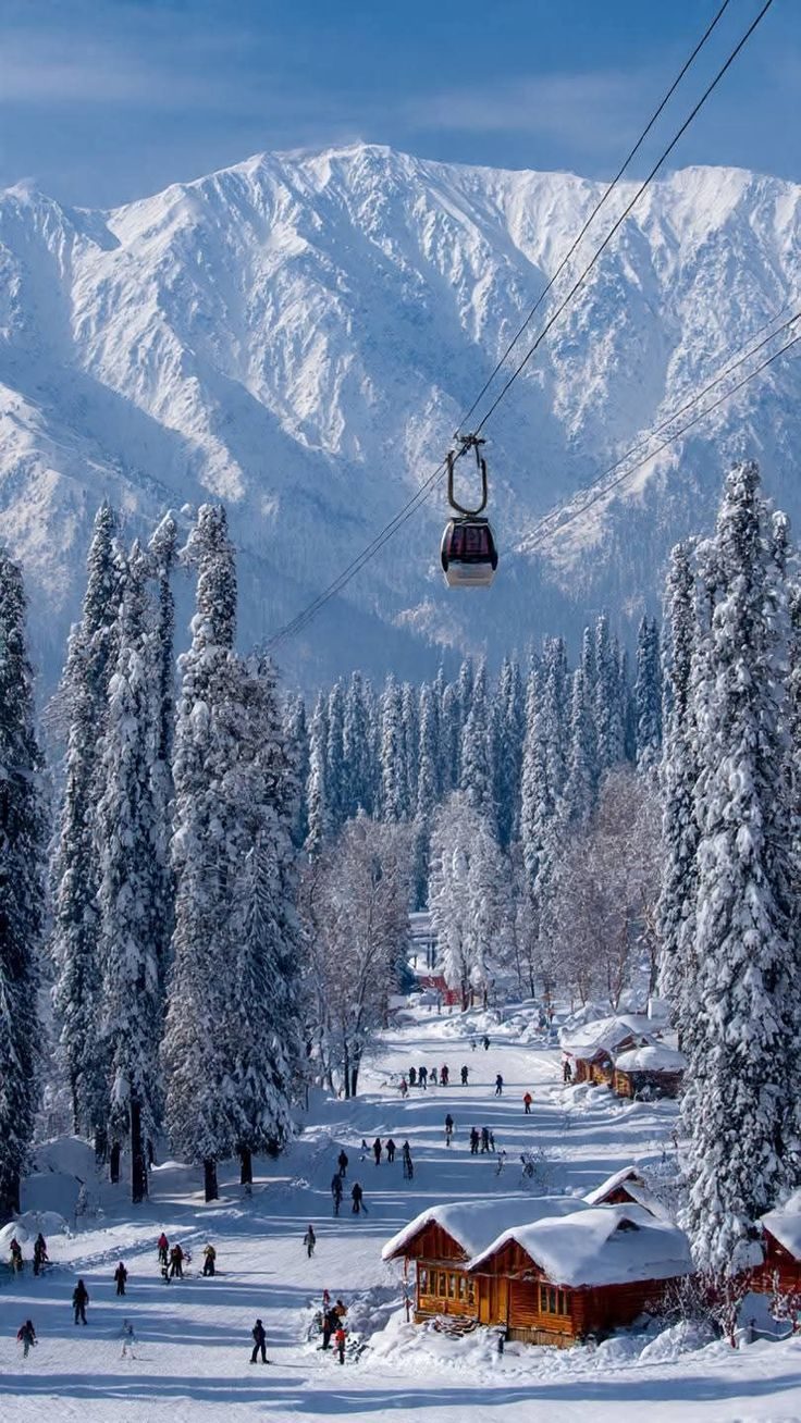 Gondola over snowy slopes, Kashmir